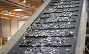 Shreds of metal on a conveyor belt at an HP computer recycling facility in Roseville, California 